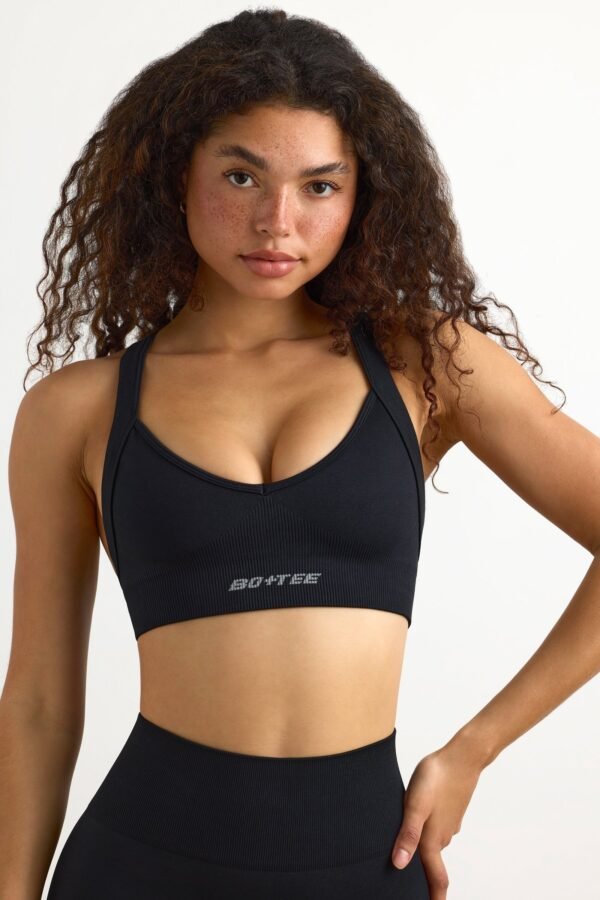 Super Sculpt Seamless Cross-Back Sports Bra in Black - Image 4