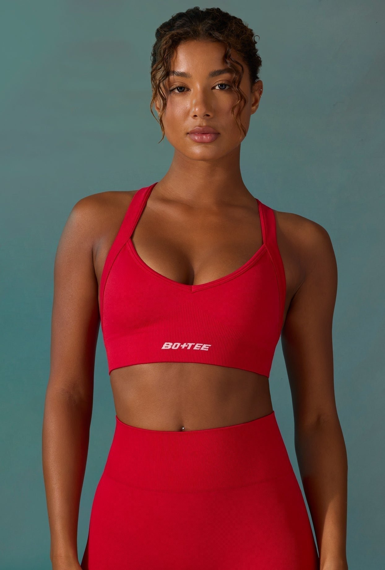Purpose - Super Sculpt Seamless Cross Back Sports Bra in Tango Red - Image 6