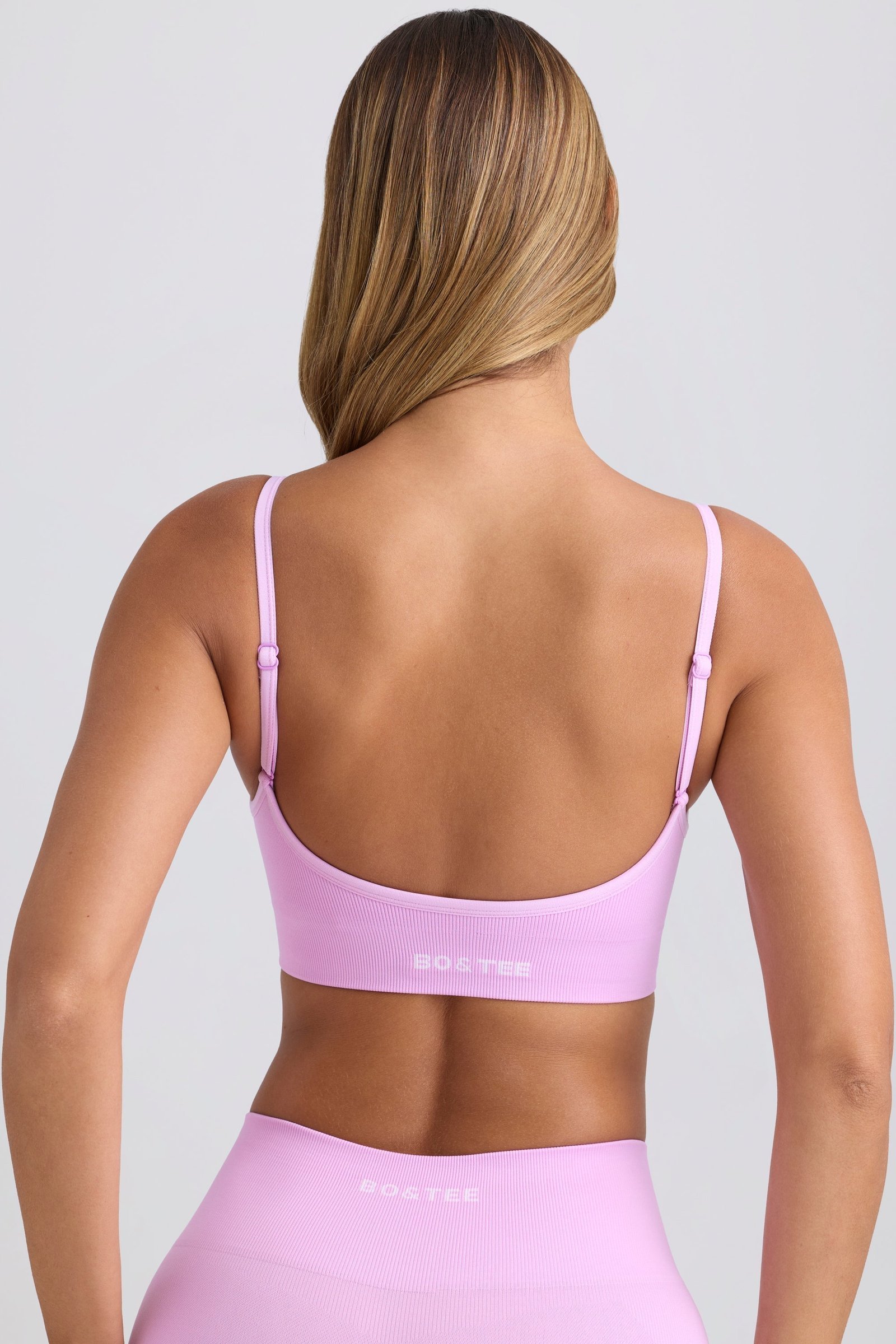 Super Sculpt Seamless Scoop-Back Sports Bra in Violet Pink - Image 3
